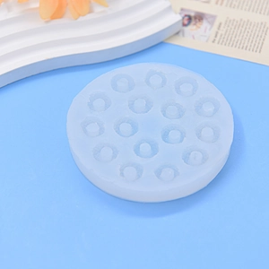 Blue silicone donut mold with 17 holes for fondant, chocolate and candle making