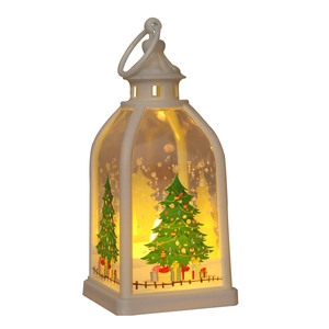 White Christmas LED lantern with festive tree prints and warm glowing light for tabletop