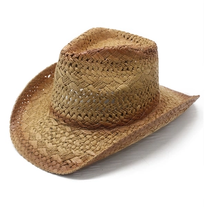 Close-up of a woven straw western cowboy hat featuring curved brims and natural textures