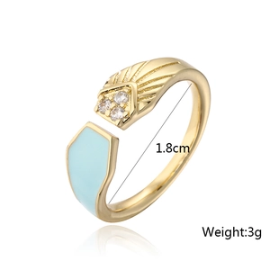 Detail shot of gold-plated ring showing 1.8cm inner diameter and light blue enamel work