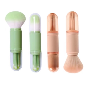 Portable 4-in-1 telescopic makeup brush set with green and nude dual-head design