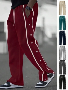 Detail showing side button snaps on joggers and diverse color options for men