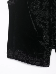 Detail of premium black velvet vest featuring intricate paisley beadwork embroidery