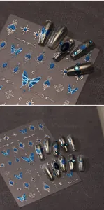 Detailed blue butterfly and silver star moon nail art stickers in gothic relief style