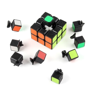 Disassembled 3x3 speed cube showing inner white core structure and colorful parts