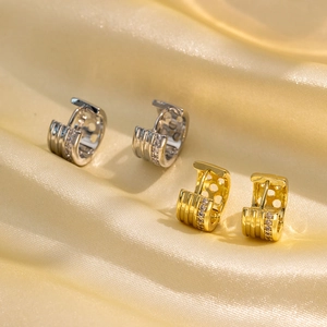 Elegant double-line polished hoop earrings with cubic zirconia on champagne satin silk