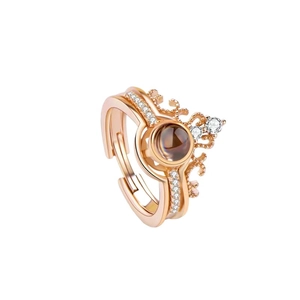 Elegant rose gold crown ring with 100 languages projection stone and zircon accents