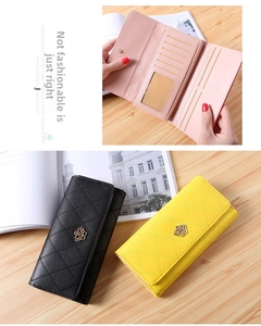 Detail of a quilted PU leather wallet with gold crown buckle and multi-card slot interior