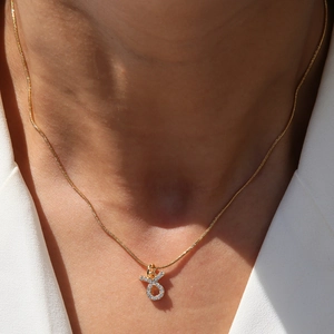 18k gold Taurus zodiac necklace with micro-set zircon on a sleek snake chain