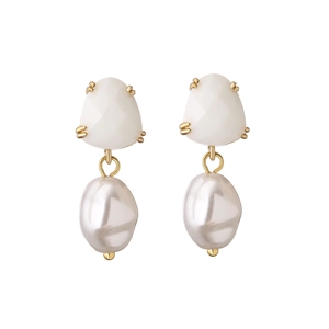 Detail of 18K gold plated brass earrings with white zircon and baroque pearl drops