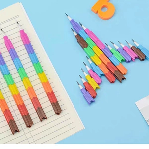 Rainbow stackable pencils in building block style assembled into a toy airplane shape