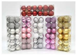 Detail of assorted matte and glitter Christmas ornament balls packed in clear tubes