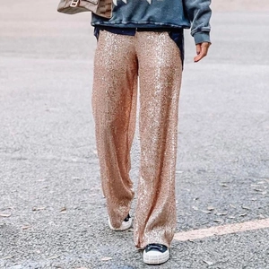 Fashionable champagne gold sequin wide leg pants for party and festive occasions