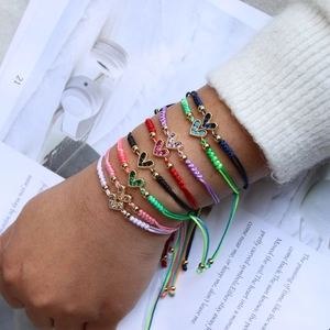 Adjustable woven lucky bracelets with colorful pavé zircon heart pendants in various colors