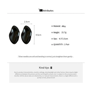 Scheda tecnica orecchini ovali neri con dimensioni 4,5cm x 2,5cm e dettagli sul peso