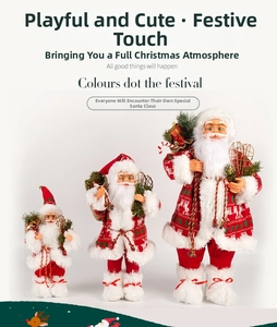 Three Santa Claus figurines in different sizes with gift bags for Christmas decoration