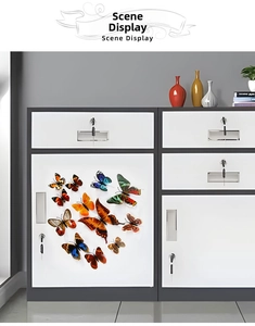 Detailed view of 3D colorful butterfly wall stickers applied on white furniture surface