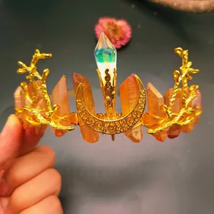 Detail view of handmade golden branch tiara featuring raw crystals and crescent moon