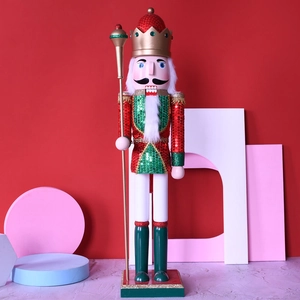Detail of 62cm wooden nutcracker king with sequins and scepter for Christmas decor