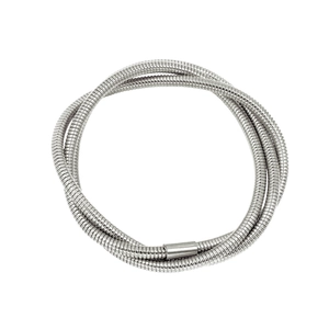 Macro shot of silver stainless steel snake chain with flexible spiral braided texture