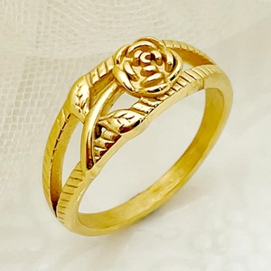 Detailed close-up of a vintage rose design on a dual-layer gold stainless steel ring
