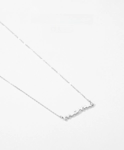 Detail shot of the S925 sterling silver chain with a polished mama letter pendant