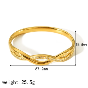 Detail of 18k gold plated stainless steel wave bracelet showing 67.2mm inner diameter