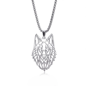 Macro shot of a geometric wolf head pendant on a silver stainless steel chain link