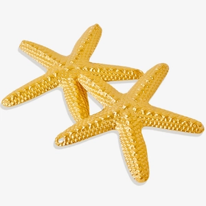 Close-up of golden 304 stainless steel starfish charms with detailed textured surface