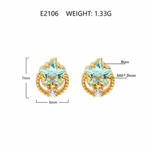Detail of moon and star gold studs with blue AAA zircon stones and 7mm dimensions