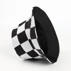 Classic checkered bucket hat with black and white grid pattern and stitched wide brim
