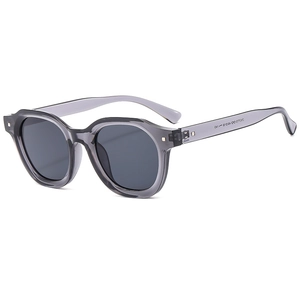 Modern square transparent grey sunglasses with dark grey lenses in a 45-degree angle view