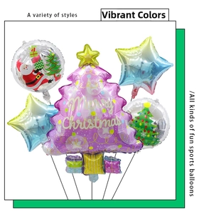 Detail of purple Christmas tree foil balloon with Merry Christmas text and star decorations