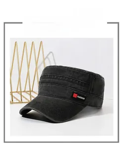 Close-up of FS Fashion label on a black washed cotton flat top military cap