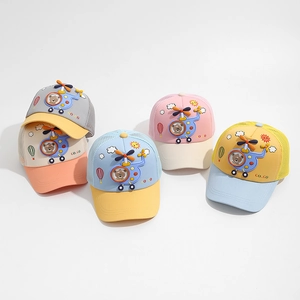 Detail of mesh baseball caps for kids with 3D rubber helicopter and breathable mesh back