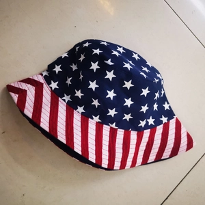 Detailed top view of the US flag stars and stripes pattern on canvas bucket hat