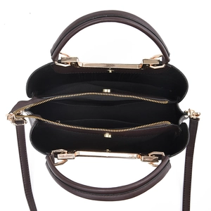 Fashionable dark brown vintage handbag with multi-compartment interior and gold hardware