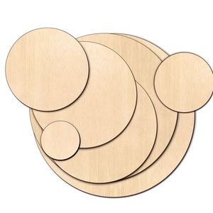 Artistic stack of natural round wooden slices for DIY crafts in various sizes