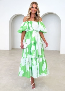 Detail of floral puff sleeves and off-shoulder neckline on a green tiered maxi dress