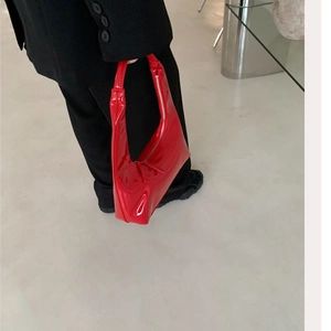 Retro red patent leather crescent shoulder bag for women with minimalist moon shape design