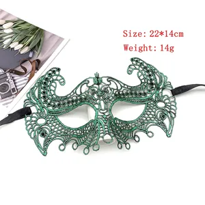 Detail of green lace Halloween mask with embroidery, size 22x14cm and 14g weight