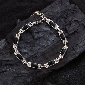 Vintage silver bracelet with rectangular black crystals and sparkling zircon accents