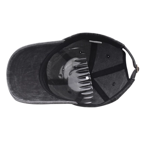 Detail view of cotton washed baseball cap interior with adjustable strap and 100% cotton label