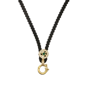Braided black necklace cord with gold lobster clasp and green gemstone pendant connector