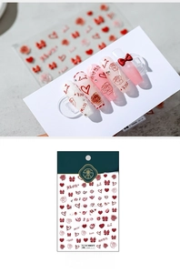 Detail of 3D embossed red rose, heart and bow nail stickers TS-1345 with cursive text