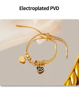Macro shot of 18K gold plated heart bracelet with colorful crystals and PVD finish