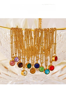 Close-up of multicolored 18K gold-plated stainless steel birthstone crystal necklaces