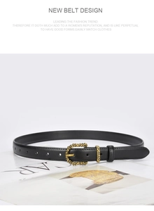 Close-up of black leather belt featuring an embossed gold vintage texture buckle