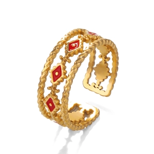 Bohemian gold plated stainless steel triple layer wavy ring with red enamel accents