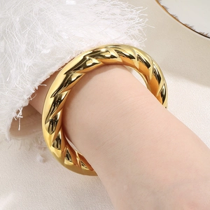 Exaggerated 18k gold plated spiral twisted cuff bracelet in high polished stainless steel